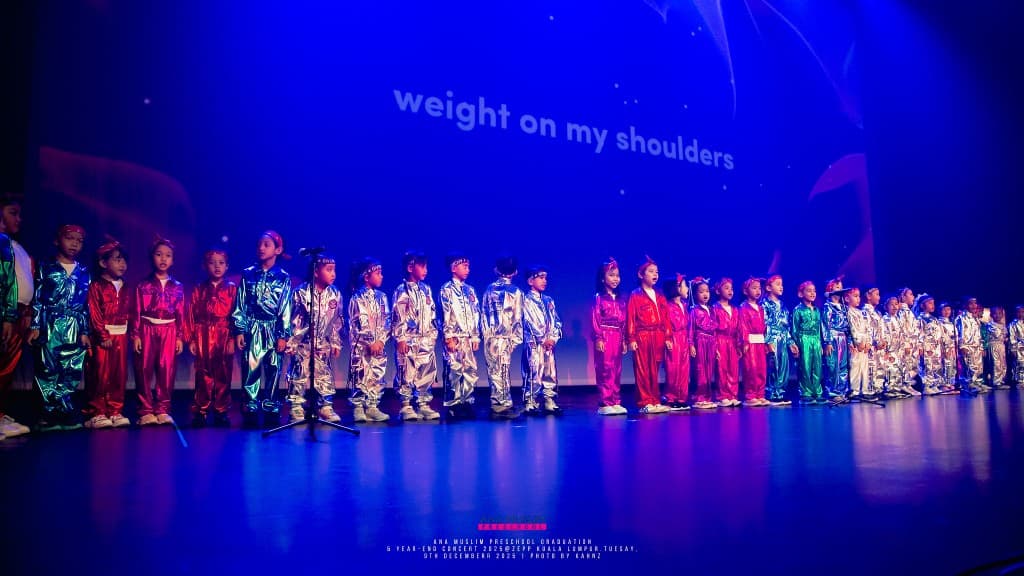 AMP Preschool children performing on stage at the year-end concert
